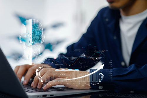 Persona che digita al laptop con proiezione digitale di volto AI e grafici, rappresentazione del controllo sui contenuti delle soluzioni AI di Archetype.